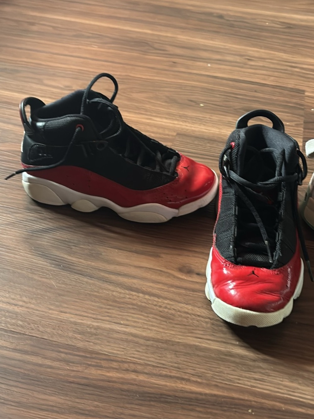 Jordan Kids Black and Red Mid-Top Sneakers